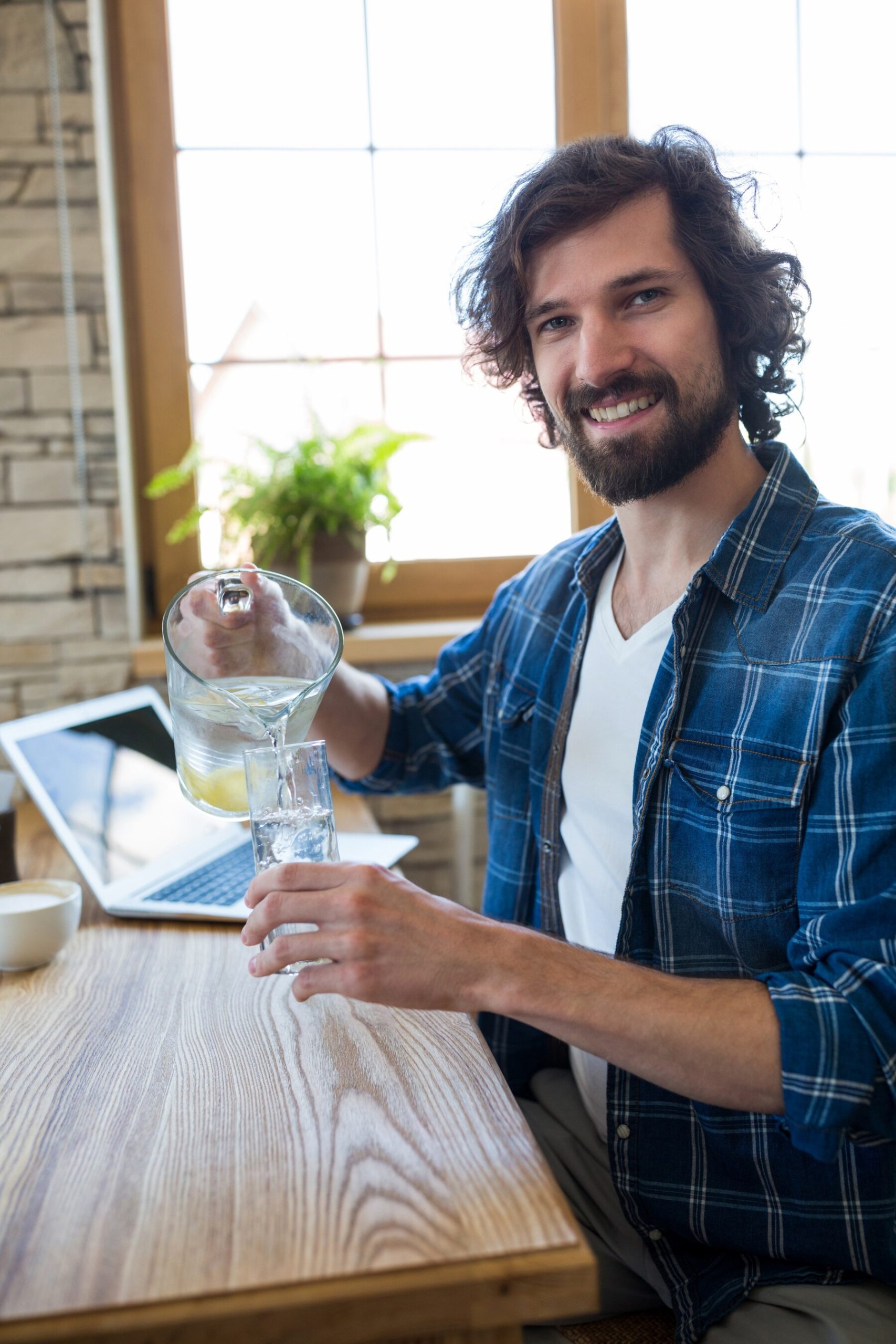 smiling-man-pouring